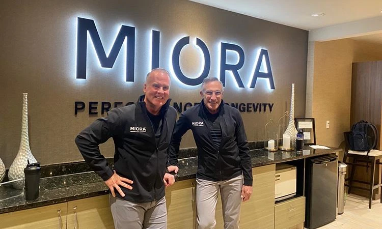 Jeff Zwiefel, president of Life Time (left)